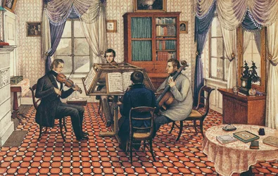 Antonio y tres amigos tocando un cuarteto de cuerdas
